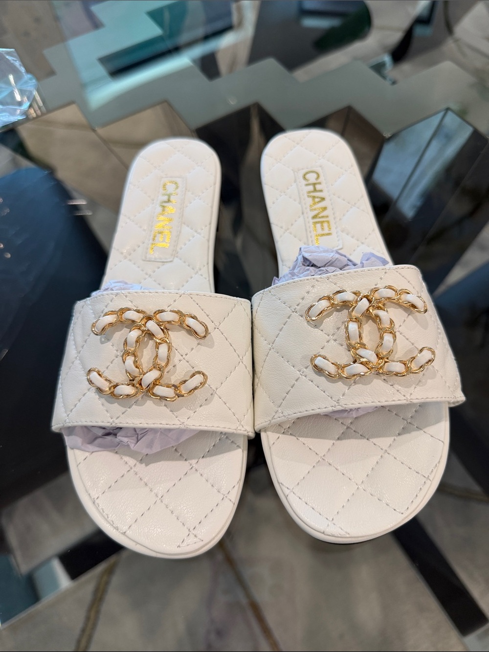 White Quilted Leather Slide Mules with Gold Chain logo